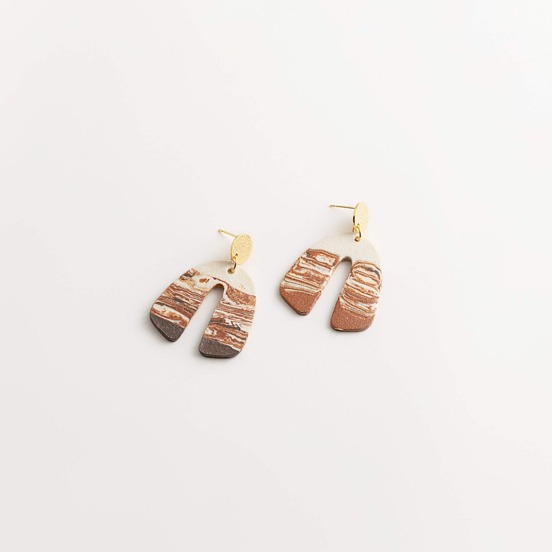 Artisan Nerikomi Ceramic Earrings – Gold Matte Circle Stud, Wide Open Arch Drop
