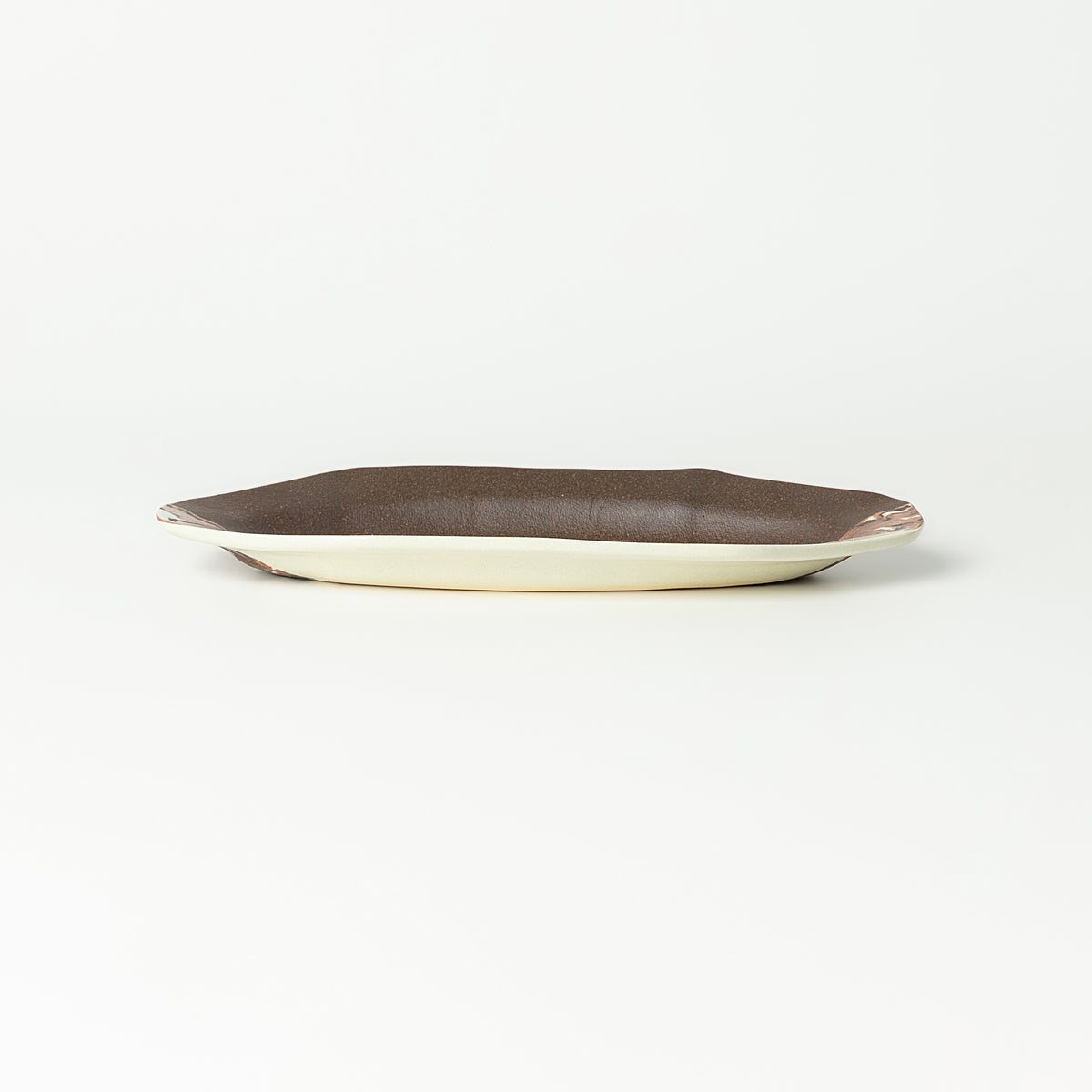 Handcrafted Nerikomi Ceramic Leaf-Shaped Plate – Marbled Stoneware